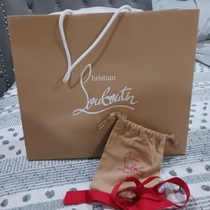 Christian Louboutin 3 pieces. Bag, dustbag pouch, and ribbon